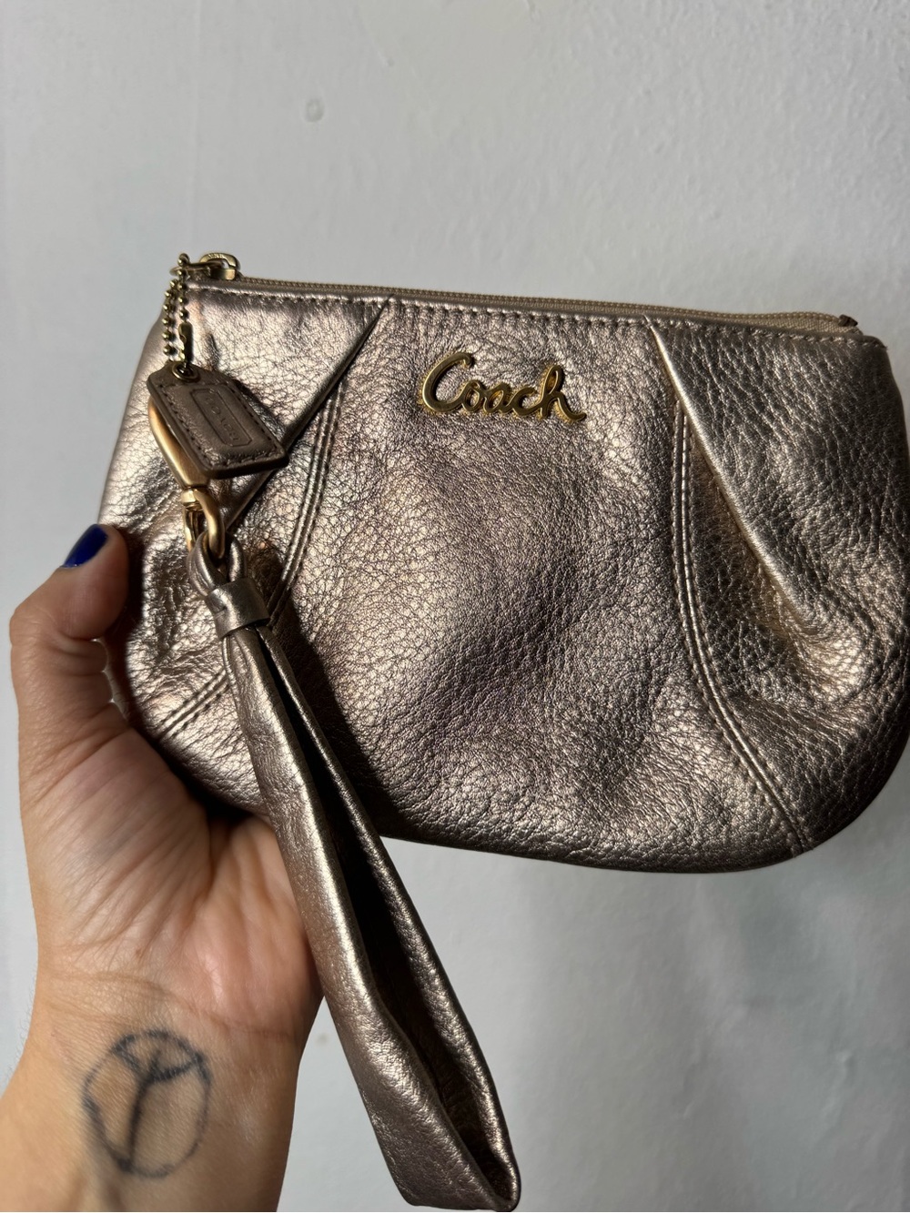 Coach wristlet bronze like new